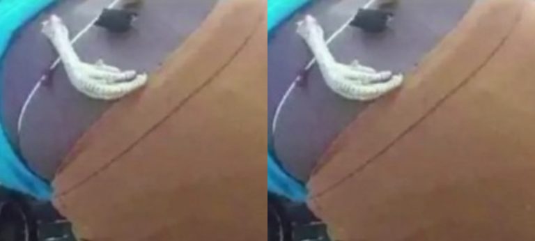 Dansoman: Waakye Seller Spotted With Chicken Leg Tied To Her Beads Allegedly To Win More Customers