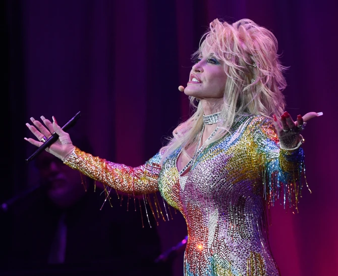 Why Does Dolly Parton Always Wear Long Sleeves?
