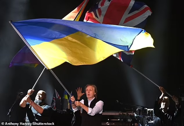 paul-mccartney-shows-his-solidarity-with-war-torn-ukraine-by-waving-the-countrys-flag-during-his-glastonbury-set