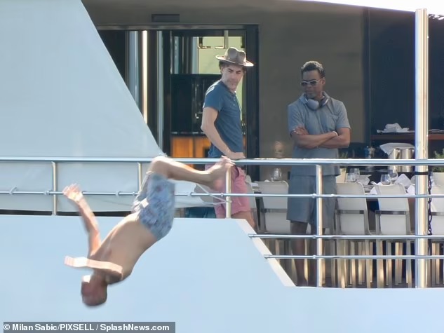 woody-harrelson-backflips-off-a-yacht-as-he-enjoys-morning-swim-with-chris-rock-and-others